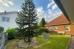 Walmdachbungalow in Marne - Stilvolles Wohnen mit Gartenblick und Wintergarten! - Bungalow Marne | Angebot:26835885