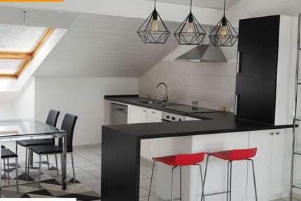 Freundliche Dachgeschosswohnung in zentraler Lage 3 zimmer