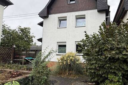 Ein Zweifamilienhaus zum Wohlfühlen, mit großem Garten und Garage in Unkel 6 zimmer