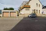 Wohn- und Geschäftshaus in St. Ingbert - für Investoren - mit Wohnung, Gewerbe, Garten und Garagen - Reihenendhaus Sankt Ingbert St. Ingbert | Angebot:23973449