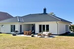 Jetzt Miete möglich! Winkelbungalow 5 km bis Neubrandenburg, Baujahr 2022, Doppelgarage, EBK,Carport - Einfamilienhaus Sponholz | Angebot:25929684