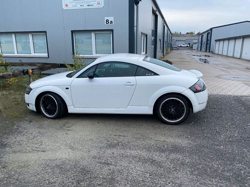 TT
