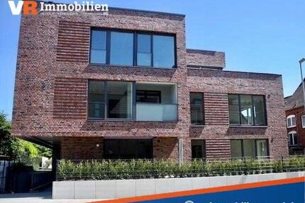 Neuwertige 3-Zimmer-Wohnung mit Tiefgaragenstellplatz im Herzen von Husum zu vermieten!