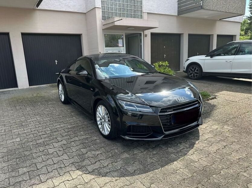 TT