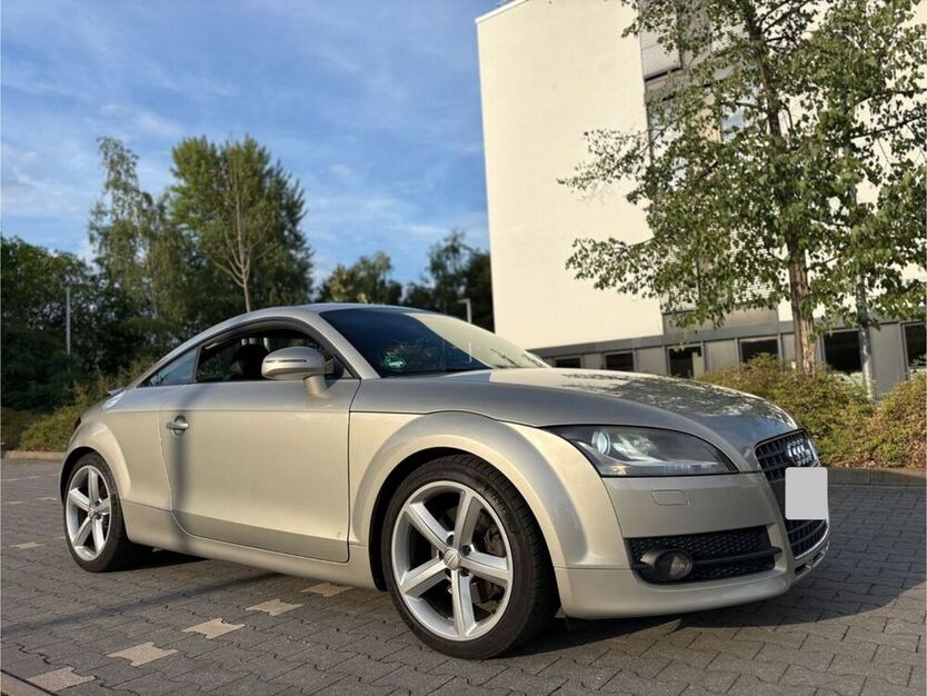 TT