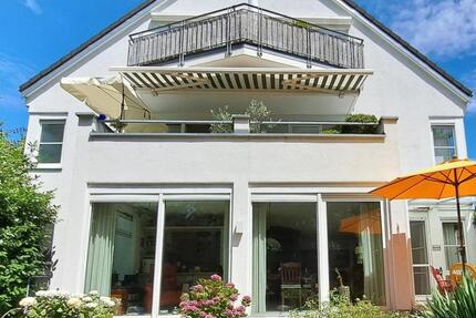 Helle EG-Wohnung mit eigenem Garten, zwei Terrassen und zwei TG-S 3 zimmer