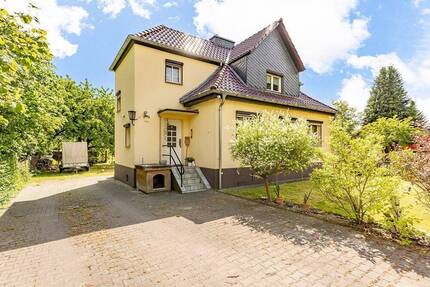 Charmantes Einfamilienhaus mit 5 Zimmern und großem Garten