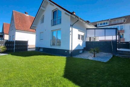 Modernes EFH mit neuer Gashybridheizung zimmer