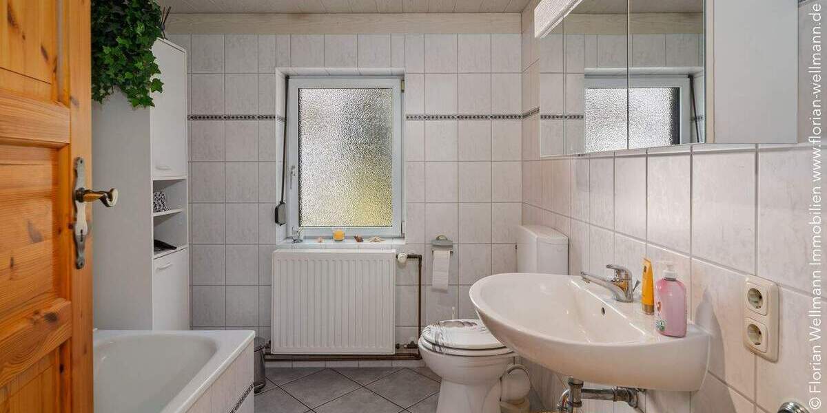 Oyten - Bassen | Gepflegtes Einfamilienhaus mit viel Platz, zwei Terrassen, großem Garten und Doppelgarage in idyllischer Ortsrandlage 7 zimmer