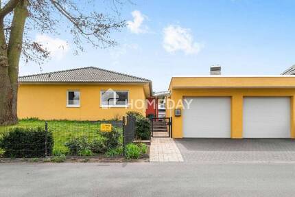 Top gepflegter Bungalow mit Doppelgarage, großem Grundstück, EBK und Extras in idyllischer Lage