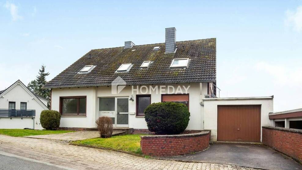 Ein Haus, drei Einheiten, unendliche Möglichkeiten - und ein Ausblick, der begeistert