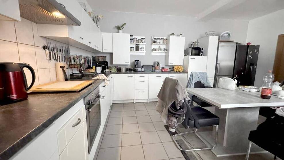 6 Wohnungen & 1 Ladenlokal. Balkone & Garagen. Liebevoll gepflegt & modernisiert.
