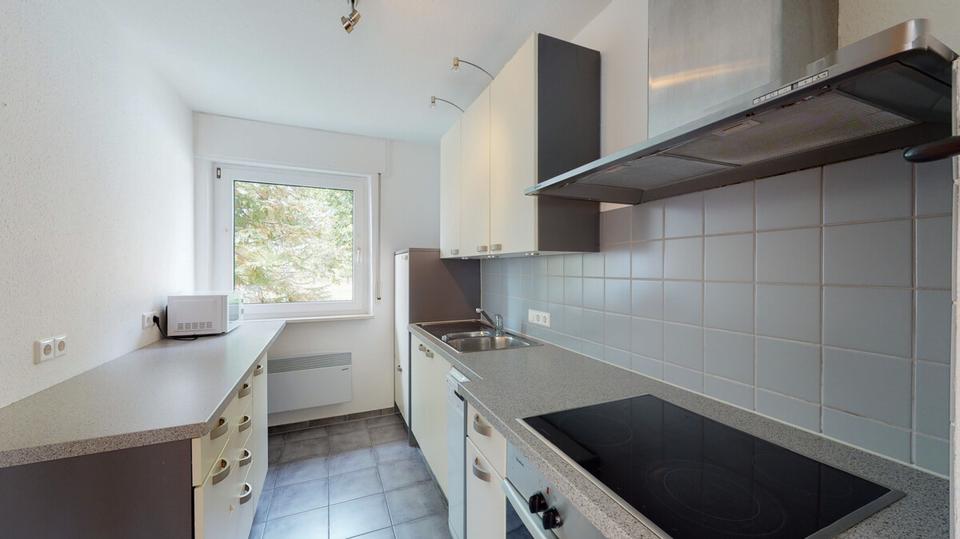 Charmante 3-Zimmer-Hochparterrewohnung mit Balkon, Garage und Gartennutzung in Au am Rhein 3 zimmer