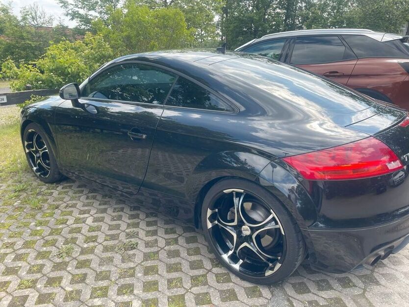 TT