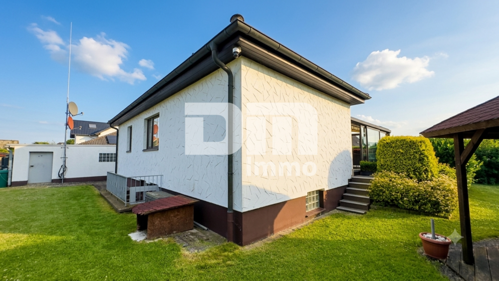 Solider Familien-Bungalow mit großem Potenzial in ruhiger Lage mit Wintergarten und Garage - Bungalow Calden | Angebot:26974963