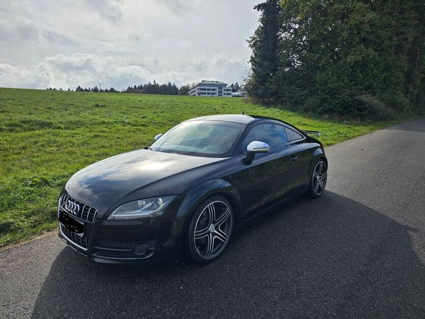 TT