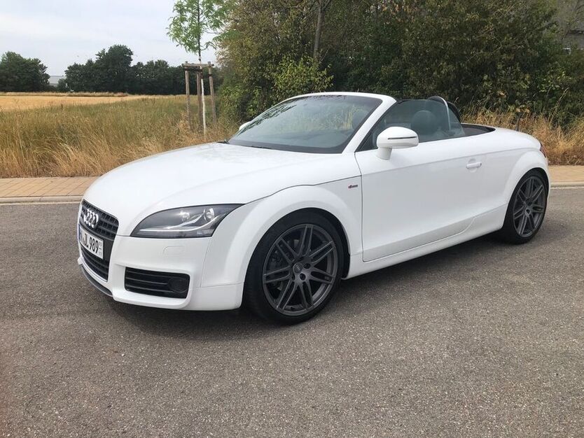 TT