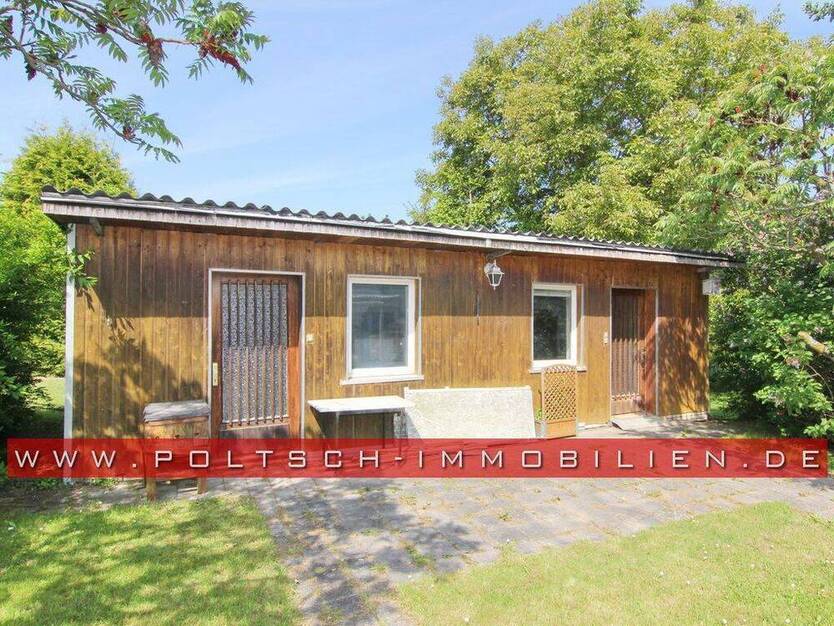 EFH im Bungalowstil mit Wintergarten, Keller und großem Grundstück in ruhiger Siedlungslage