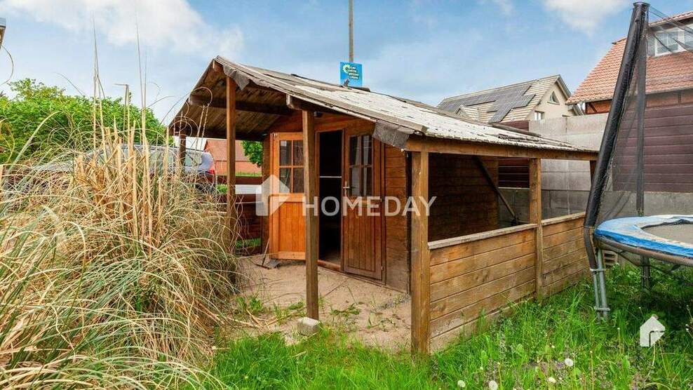 Charmantes Mehrfamilienhaus mit zwei Wohneinheiten, Garage, Carport und großzügigem Garten 8 zimmer