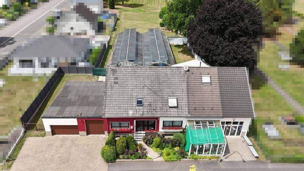 Leben und Arbeiten unter einem Dach - vielseitiges Wohn- und Geschäftshaus mit Gartenidylle