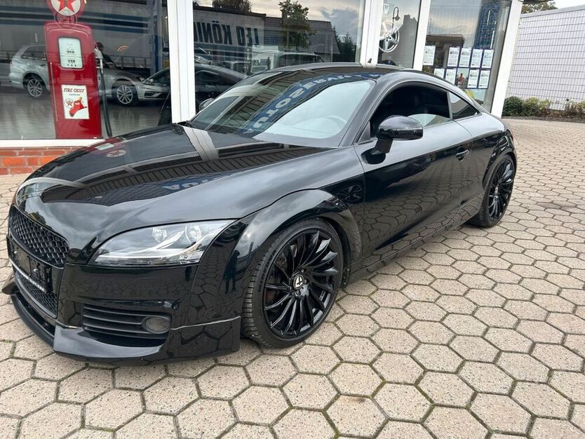 TT