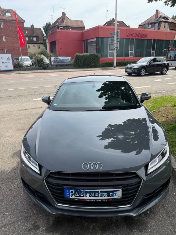 TT