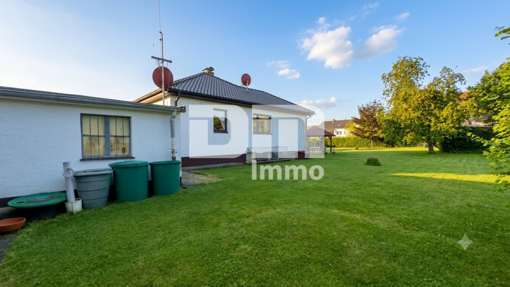 Solider Familien-Bungalow mit großem Potenzial in ruhiger Lage mit Wintergarten und Garage - Bungalow Calden | Angebot:26974963