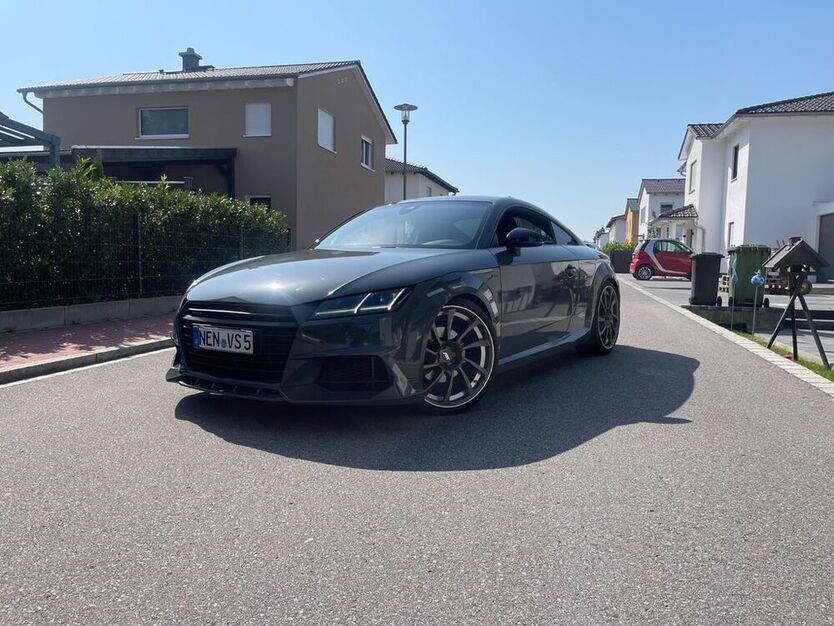 TT