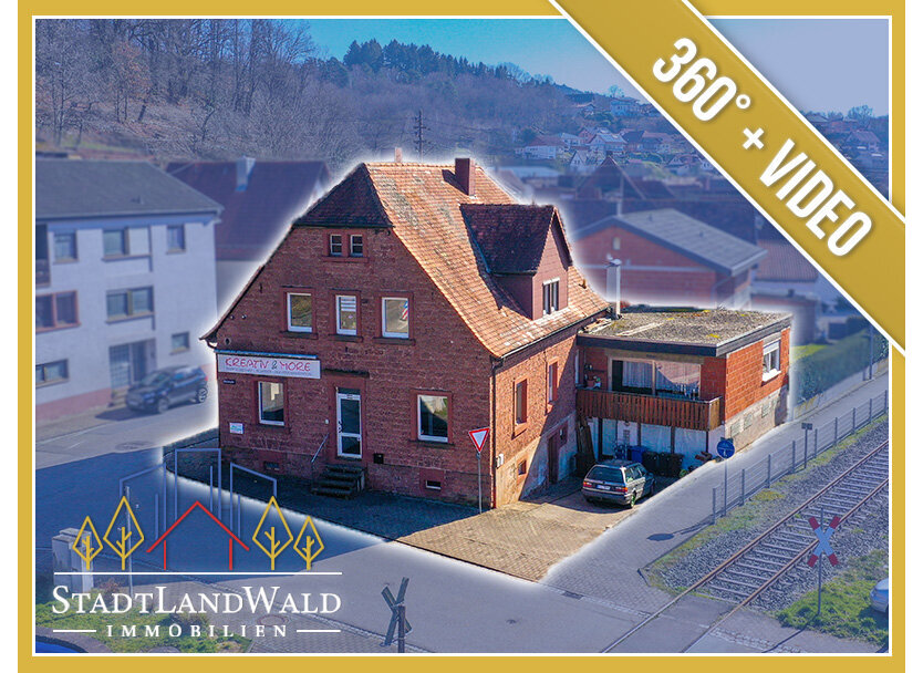 Großes Mehrfamilienhaus mit 2 Wohnungen, 2 Gewerbeeinheiten und Entwicklungspotenzial