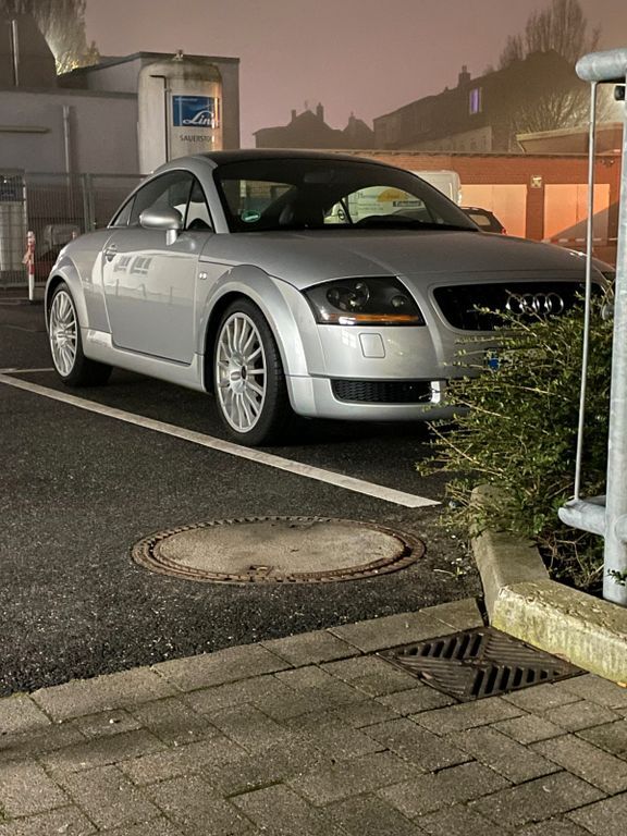 TT