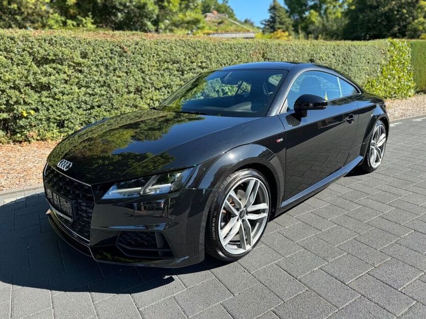 TT