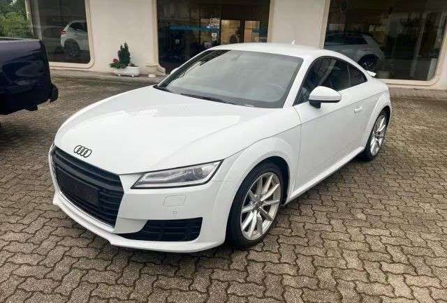 TT