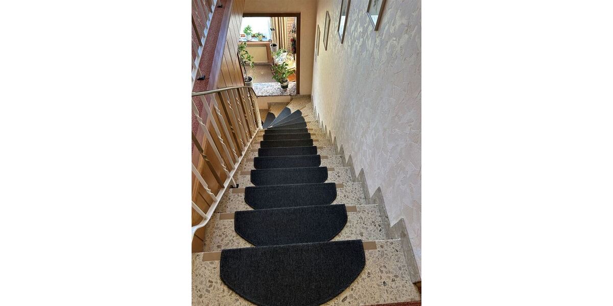 Interessantes Wohnhaus mit 2 Wohnungen, Nebengebäude und Grünland - Einfamilienhaus Stolzenau | Angebot:27021703