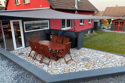 Einfamilienhaus mit Wintergarten und SouterrainWohnung