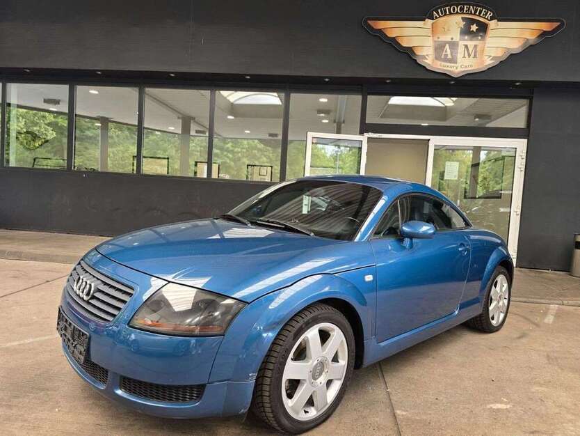 TT