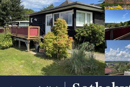 Potenzielles Baugrundstück mit reizvollen Sichtachsen und 2 Ferien - Bungalows zimmer