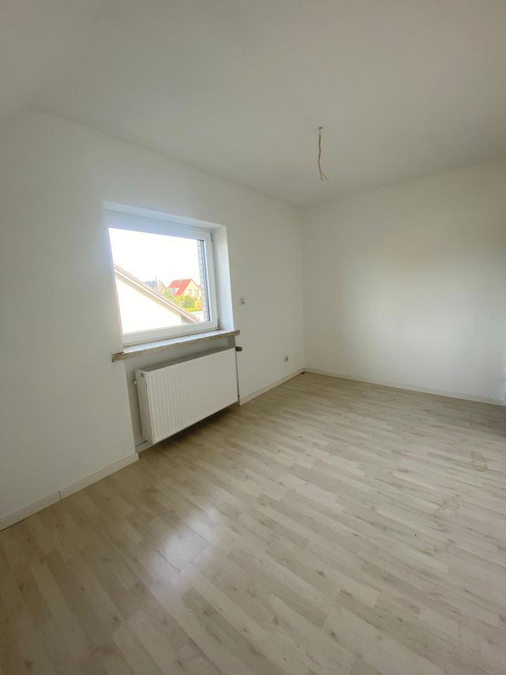 Moderne 3-Zimmer-Wohnung mit Dachterrasse und Tiefgarage in Arpke zimmer