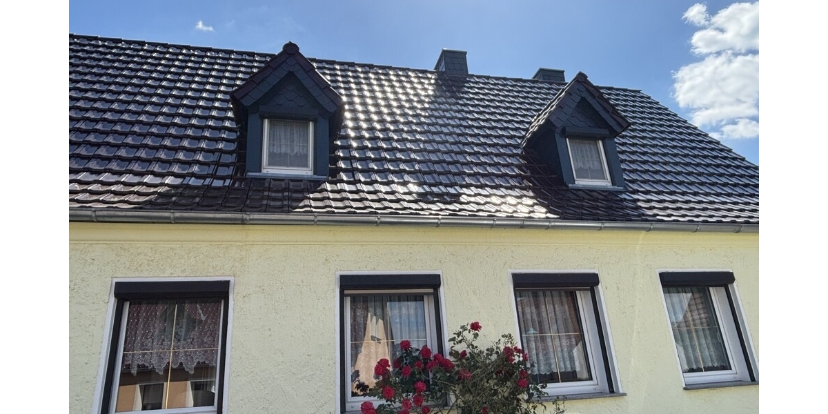 Gemütliche Doppelhaushälfte mit großem Grundstück und Doppelgarage in ruhiger Siedlungslage - Doppelhaushälfte Röderaue | Angebot:27134387
