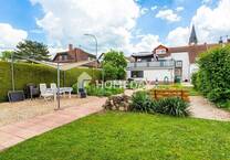 Exklusives Wohnen: Ihr neues Zuhause mit beeindruckender Dachterrasse und Gartenparadies
