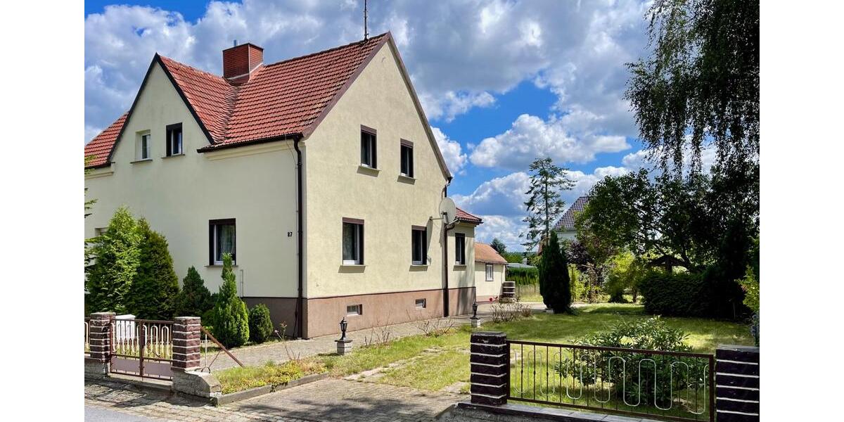 Charmante Doppelhaushälfte mit großem Garten in gefragter Lage 4 zimmer