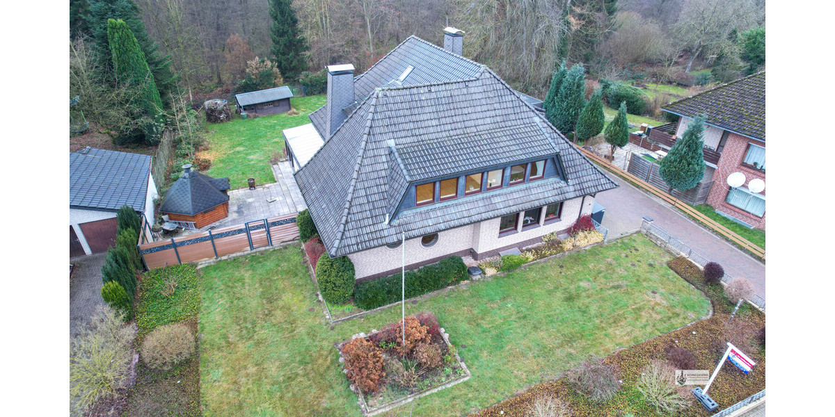 Wohnen und Arbeiten unter einem Dach +2.500 m² Waldgrundstück Sauna+Holzhäuschen Wintergarten+Kamin - Zweifamilienhaus Syke | Angebot:24213006