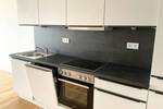 Helle 2-Zimmer-Wohnung mit Terrasse, moderne Neubau-Ausstattung mit Echtholzparkett + Einbauküche