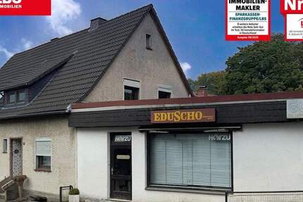 Zweifamilienhaus mit Gewerbe 5 zimmer