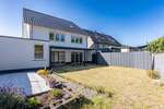Neuwertiges Mehrfamilienhaus in Hamm-Heessen: 3 Einheiten, Gewerbefläche & privater Garten