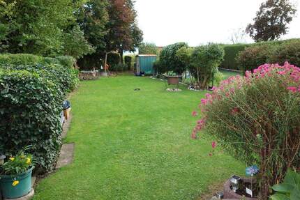 BIETERVERFAHREN: laufend modernisiertes Reihenmittelhaus, 4 Zi., mit Garten und Garage in Teising 4 zimmer