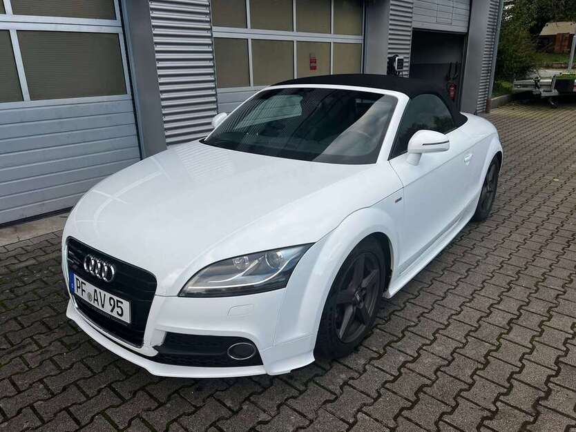 TT