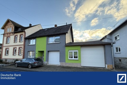 Familienfreundliche Doppelhaushälfte mit großzügiger Wohnmobilgarage!