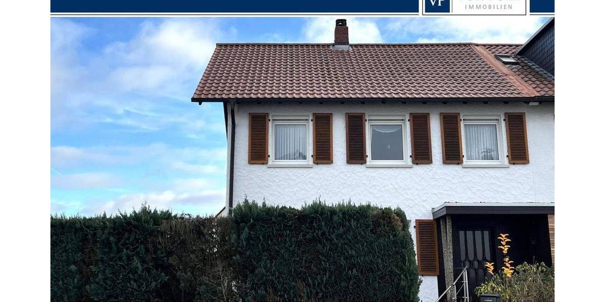 Gepflegtes Zweifamilienhaus mit eingewachsenem Garten in angenehmem Wohnumfeld 7 zimmer