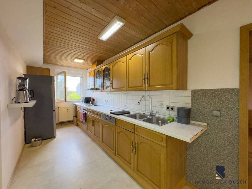 Familienfreundliches Dreifamilienhaus mit idyllischem Grundstück
