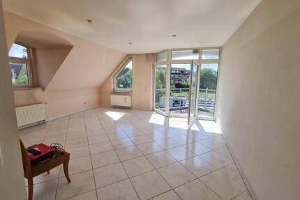 Helle 4-Zimmer-Dachgeschosswohnung mit Garage 4 zimmer